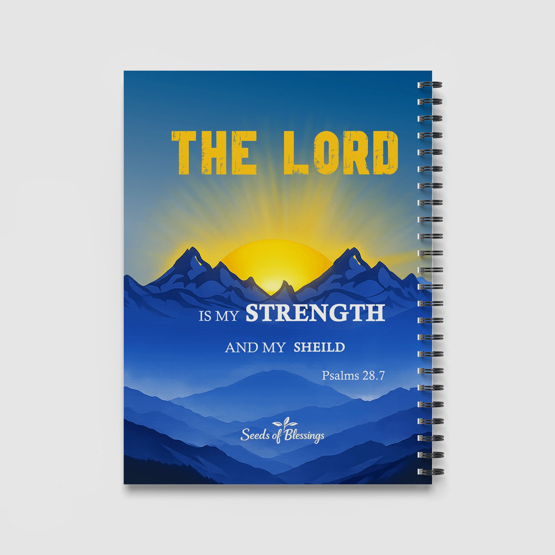 Spiral Notebook A4 - Psalm 28:7 reference with 'Seeds of Blessings' branding on serene blue mountain backdrop