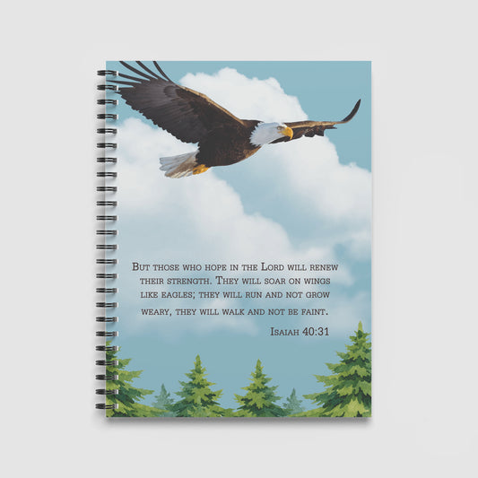 Spiral Notebook A4 - Majestic bald eagle with dark wings and white head soaring through bright blue sky with white clouds
